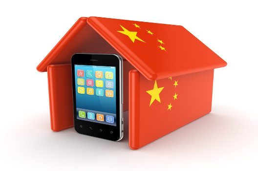 Modern mobile phone under chinese flag.